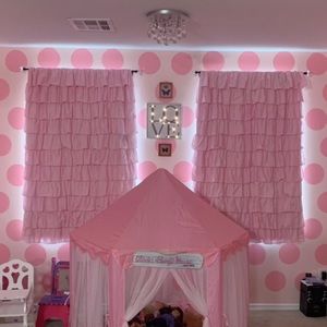 TWO pink ruffle pottery barn curtains with a room darkening liner!